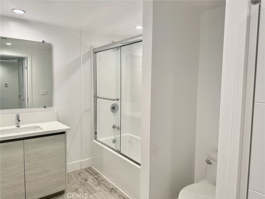 Bathroom, Glass Shower, Interior, Recessed Lighting, Wood Texture Flooring