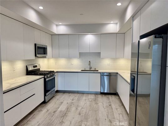 Interior, Kitchen, Recessed Lighting, Stainless Steel Appliances, Wood Texture Flooring