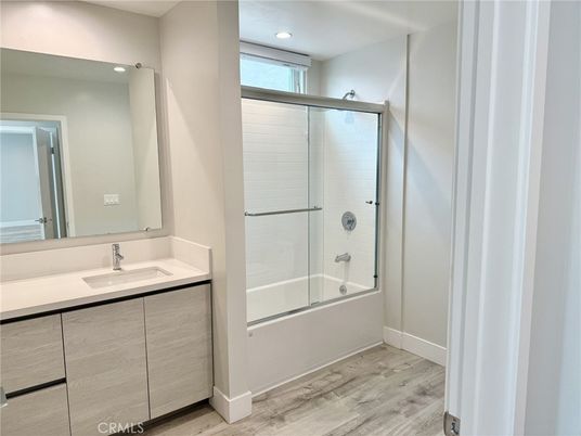 Bathroom, Glass Shower, Interior, Recessed Lighting, Wood Texture Flooring