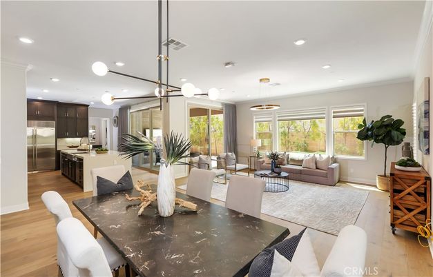 Dining room, Interior, Kitchen, Living room, Pendant Lights, Recessed Lighting, Stainless Steel Appliances, Wood Texture Flooring