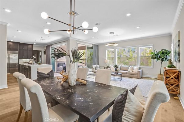 Dining room, Interior, Kitchen, Living room, Pendant Lights, Recessed Lighting, Stainless Steel Appliances, Wood Texture Flooring
