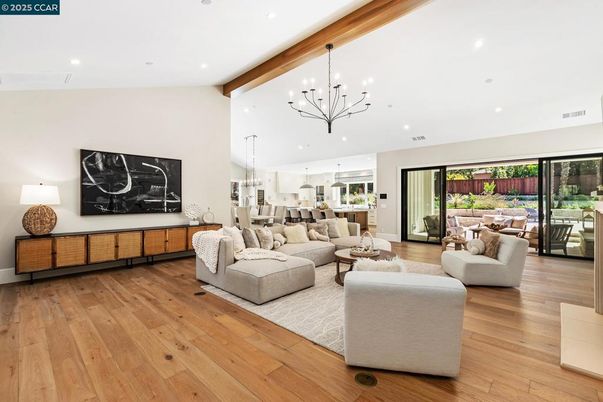 Chandelier, Dining room, Interior, Kitchen, Living room, Pendant Lights, Recessed Lighting, Wooden Beams, Wood Texture Flooring