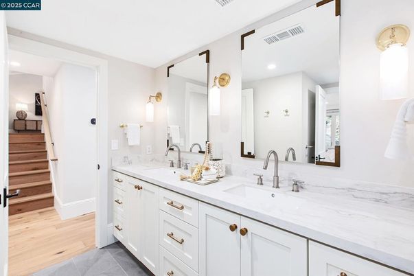 Bathroom, Dual Sink Vanities, Interior, Recessed Lighting, Wood Texture Flooring