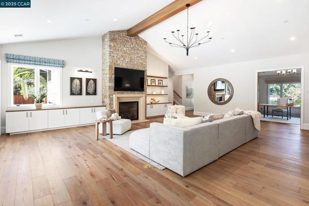 Fireplace, Interior, Living room, Pendant Lights, Recessed Lighting, Stone Walls, Wooden Beams, Wood Texture Flooring