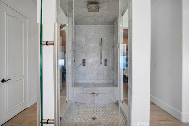 Bathroom, Glass Shower, Interior, Marble Walls, Wood Texture Flooring
