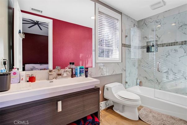 Bathroom, Glass Shower, Interior, Marble Walls, Recessed Lighting, Wood Texture Flooring