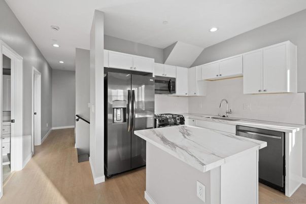 Interior, Kitchen, Recessed Lighting, Stainless Steel Appliances, Wood Texture Flooring