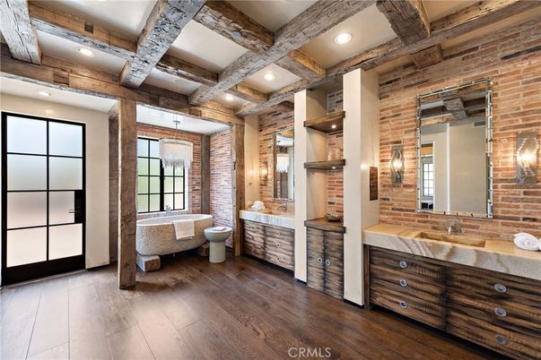 Bathroom, Dual Sink Vanities, Free Standing Baths, Interior, Recessed Lighting, Stone Walls, Wooden Beams, Wood Texture Flooring