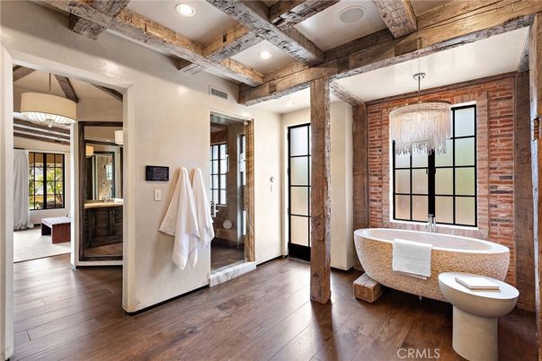 Bathroom, Chandelier, Free Standing Baths, Interior, Recessed Lighting, Stone Walls, Wooden Beams, Wood Texture Flooring