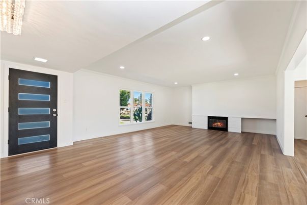 Empty room, Fireplace, Interior, Recessed Lighting, Wood Texture Flooring
