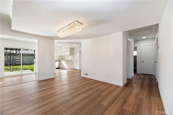 Chandelier, Empty room, Interior, Kitchen, Recessed Lighting, Wood Texture Flooring