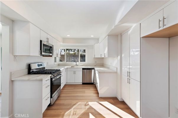 Interior, Kitchen, Recessed Lighting, Stainless Steel Appliances, Wood Texture Flooring