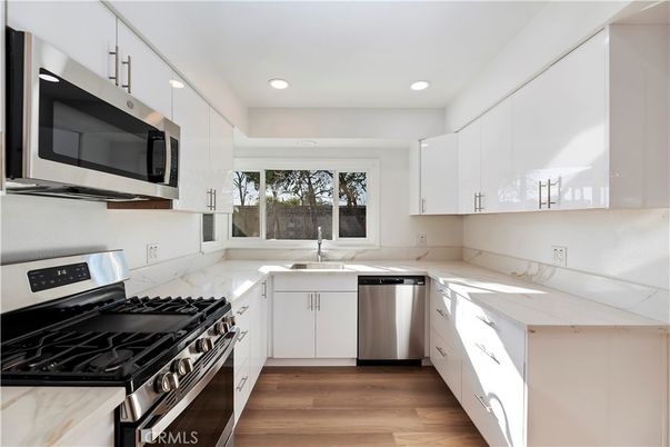 Interior, Kitchen, Recessed Lighting, Stainless Steel Appliances, Wood Texture Flooring