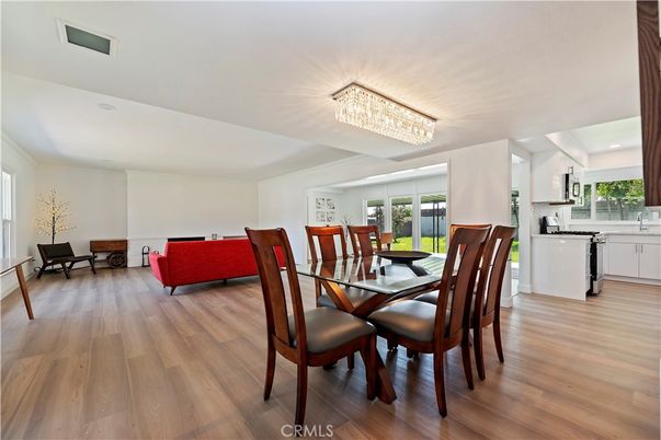 Chandelier, Dining room, Interior, Kitchen, Living room, Recessed Lighting, Wood Texture Flooring