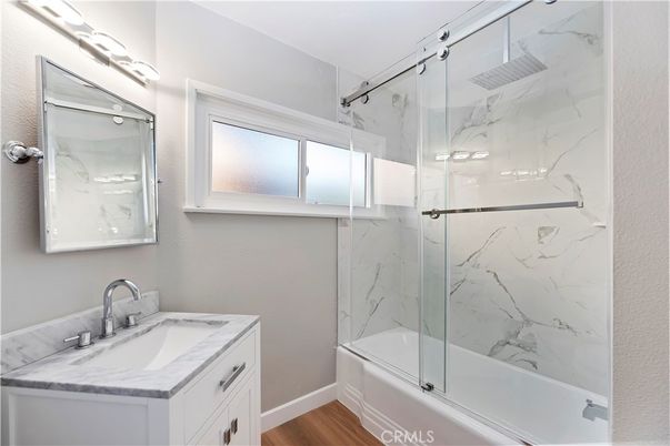 Bathroom, Glass Shower, Interior, Marble Walls, Wood Texture Flooring