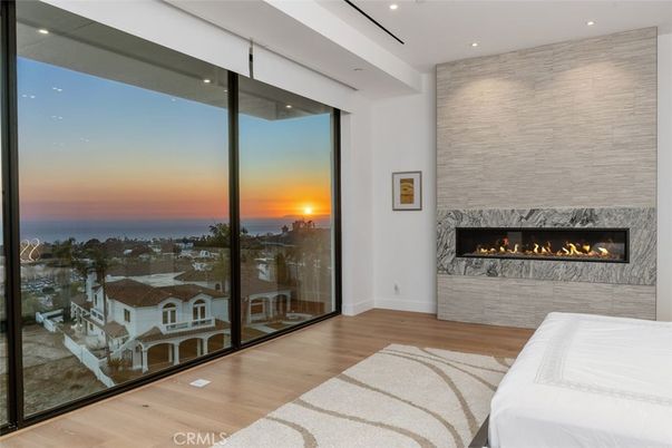 Fireplace, Interior, Living room, Recessed Lighting, Water, Wood Texture Flooring