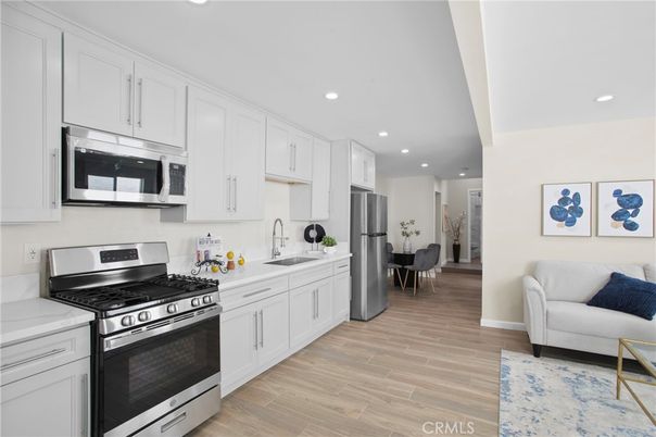 Interior, Kitchen, Recessed Lighting, Stainless Steel Appliances, Wood Texture Flooring
