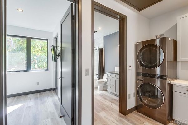 Bathroom, Interior, Recessed Lighting, Utility Closets, Washer, Wood Texture Flooring