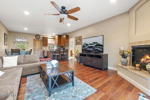 Dining room, Fireplace, Interior, Kitchen, Living room, Recessed Lighting, Wood Texture Flooring