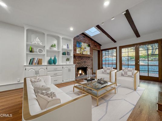 Fireplace, Interior, Living room, Recessed Lighting, Stone Walls, Water, Wooden Beams, Wood Texture Flooring