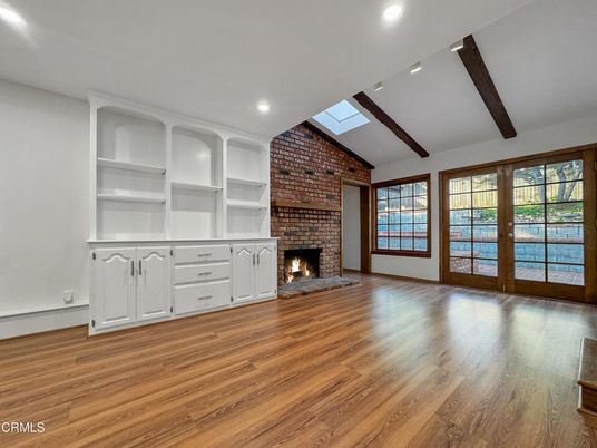 Empty room, Fireplace, Interior, Recessed Lighting, Stone Walls, Wooden Beams, Wood Texture Flooring