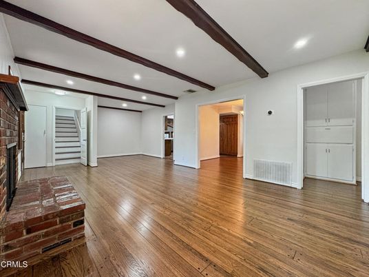 Empty room, Fireplace, Interior, Recessed Lighting, Wooden Beams, Wood Texture Flooring