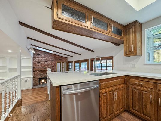 Fireplace, Interior, Kitchen, Recessed Lighting, Stainless Steel Appliances, Stone Walls, Wooden Beams, Wood Texture Flooring