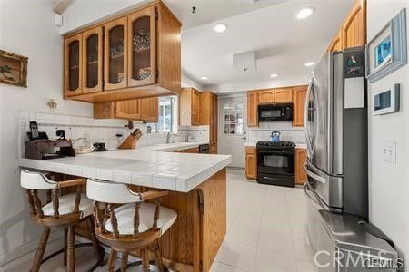 Interior, Kitchen, Recessed Lighting, Stainless Steel Appliances, Tile Countertops