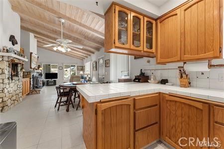 Dining room, Fireplace, Interior, Kitchen, Recessed Lighting, Tile Countertops, Wooden Beams, Wooden Ceilings