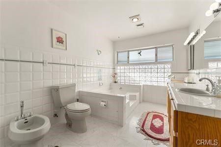 Bathroom, Dual Sink Vanities, Interior, Marble, Recessed Lighting, Tile Countertops