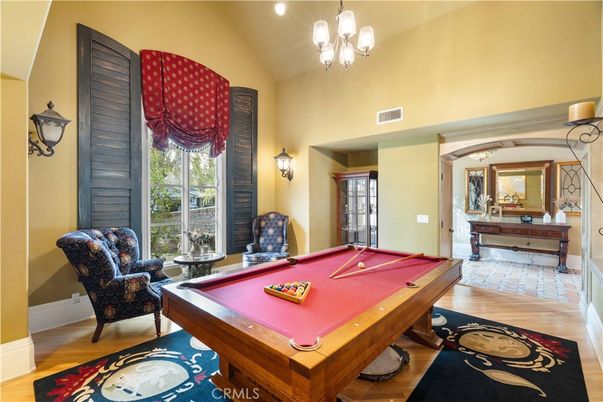 Billiard Table, Chandelier, Game Room, Interior, Pendant Lights, Recessed Lighting, Wood Texture Flooring
