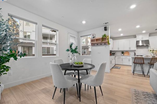 Dining room, Interior, Kitchen, Recessed Lighting, Stainless Steel Appliances, Wood Texture Flooring