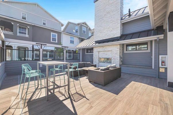 Exterior, Fireplace, Wood Texture Flooring