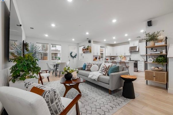 Dining room, Interior, Kitchen, Living room, Recessed Lighting, Stainless Steel Appliances, Wood Texture Flooring