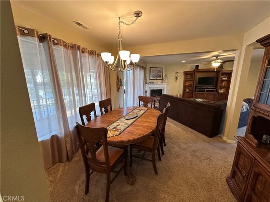 Chandelier, Dining room, Fireplace, Interior, Living room