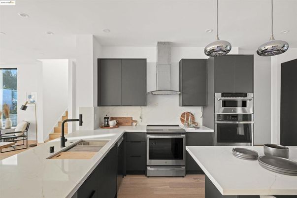 Interior, Kitchen, Pendant Lights, Recessed Lighting, Stainless Steel Appliances, Wood Texture Flooring