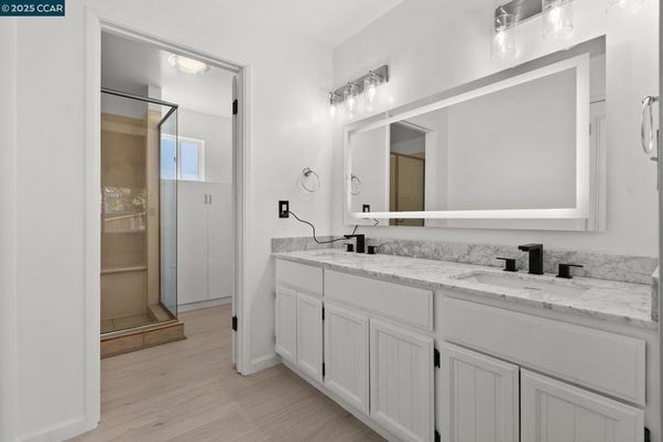Bathroom, Dual Sink Vanities, Glass Shower, Interior, Wood Texture Flooring