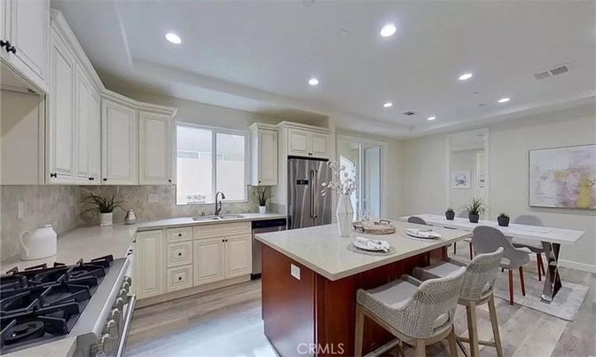 Dining room, Interior, Kitchen, Recessed Lighting, Stainless Steel Appliances, Wood Texture Flooring