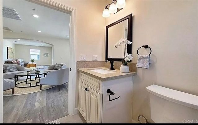 Bathroom, Dining room, Interior, Living room, Recessed Lighting, Wood Texture Flooring