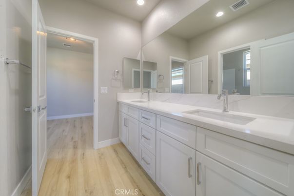 Bathroom, Dual Sink Vanities, Interior, Recessed Lighting, Wood Texture Flooring