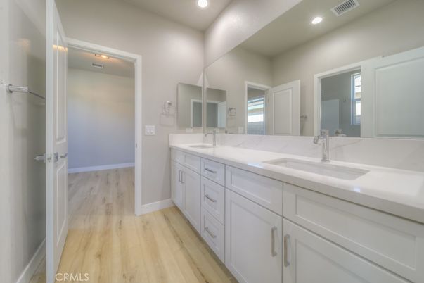 Bathroom, Dual Sink Vanities, Interior, Recessed Lighting, Wood Texture Flooring