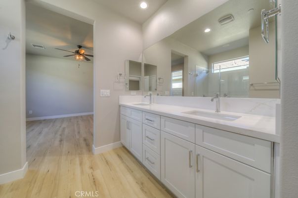 Bathroom, Dual Sink Vanities, Interior, Recessed Lighting, Wood Texture Flooring