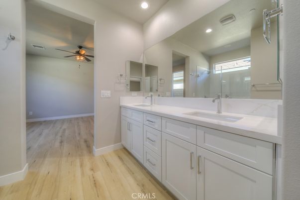 Bathroom, Dual Sink Vanities, Interior, Recessed Lighting, Wood Texture Flooring