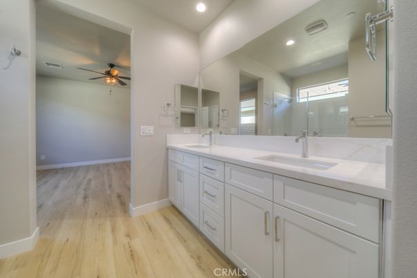 Bathroom, Dual Sink Vanities, Interior, Recessed Lighting, Wood Texture Flooring