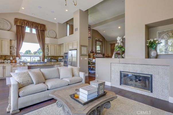 Fireplace, Interior, Kitchen, Living room, Recessed Lighting, Stainless Steel Appliances, Wood Texture Flooring
