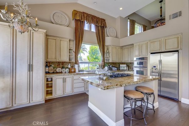 Chandelier, Interior, Kitchen, Recessed Lighting, Stainless Steel Appliances, Wood Texture Flooring