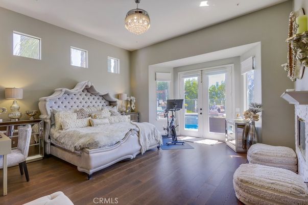 Bedroom, Fireplace, Fitness Equipment, Interior, Recessed Lighting, Wood Texture Flooring