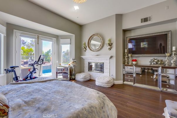 Bedroom, Fireplace, Fitness Equipment, Interior, Recessed Lighting, Wood Texture Flooring