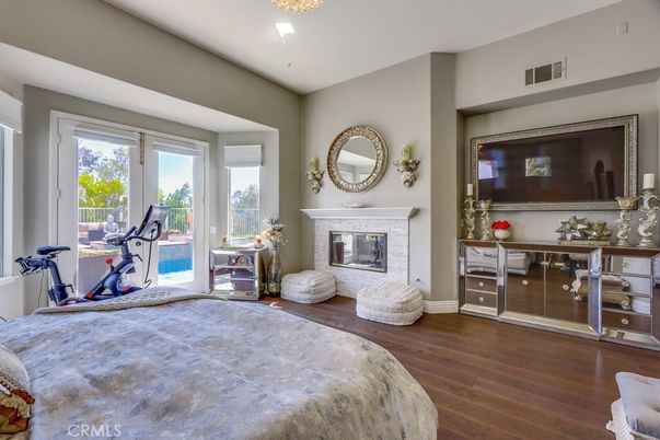 Bedroom, Fireplace, Fitness Equipment, Interior, Wood Texture Flooring
