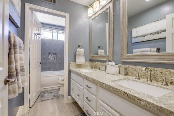 Bathroom, Dual Sink Vanities, Interior, Recessed Lighting, Wood Texture Flooring